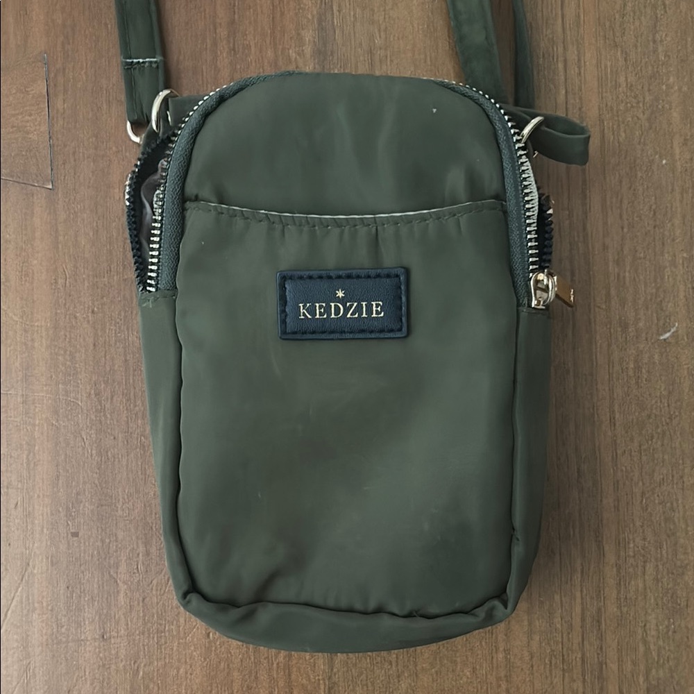 Sleek Black Belt Bag with Adjustable Strap and Water-Resistant Material